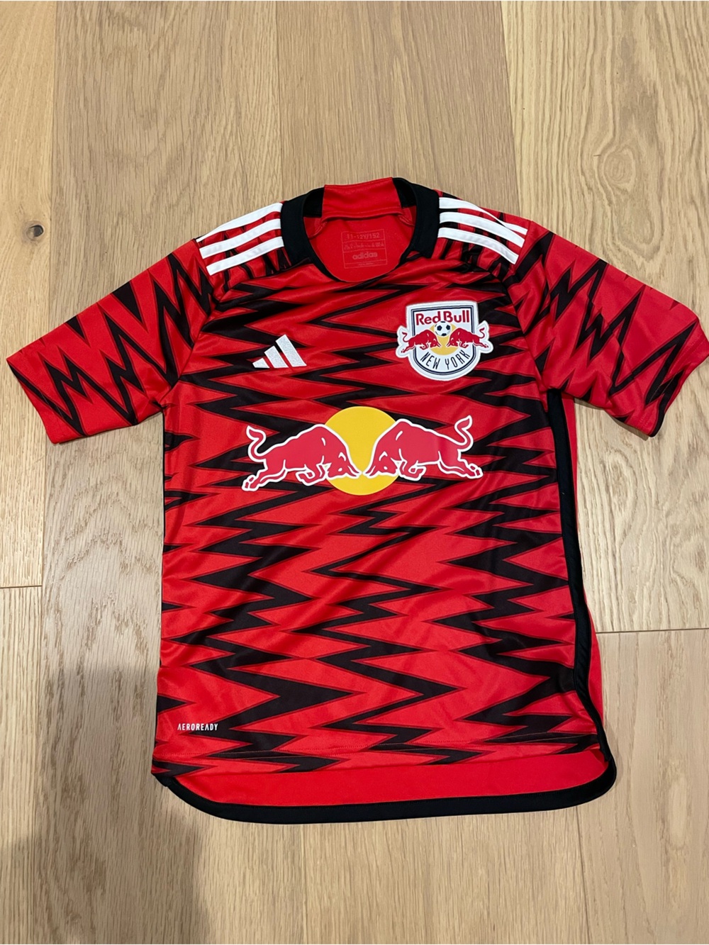 Fanatics Red New York Redbulls Kids' Soccer Jersey with Black Zigzag Pattern